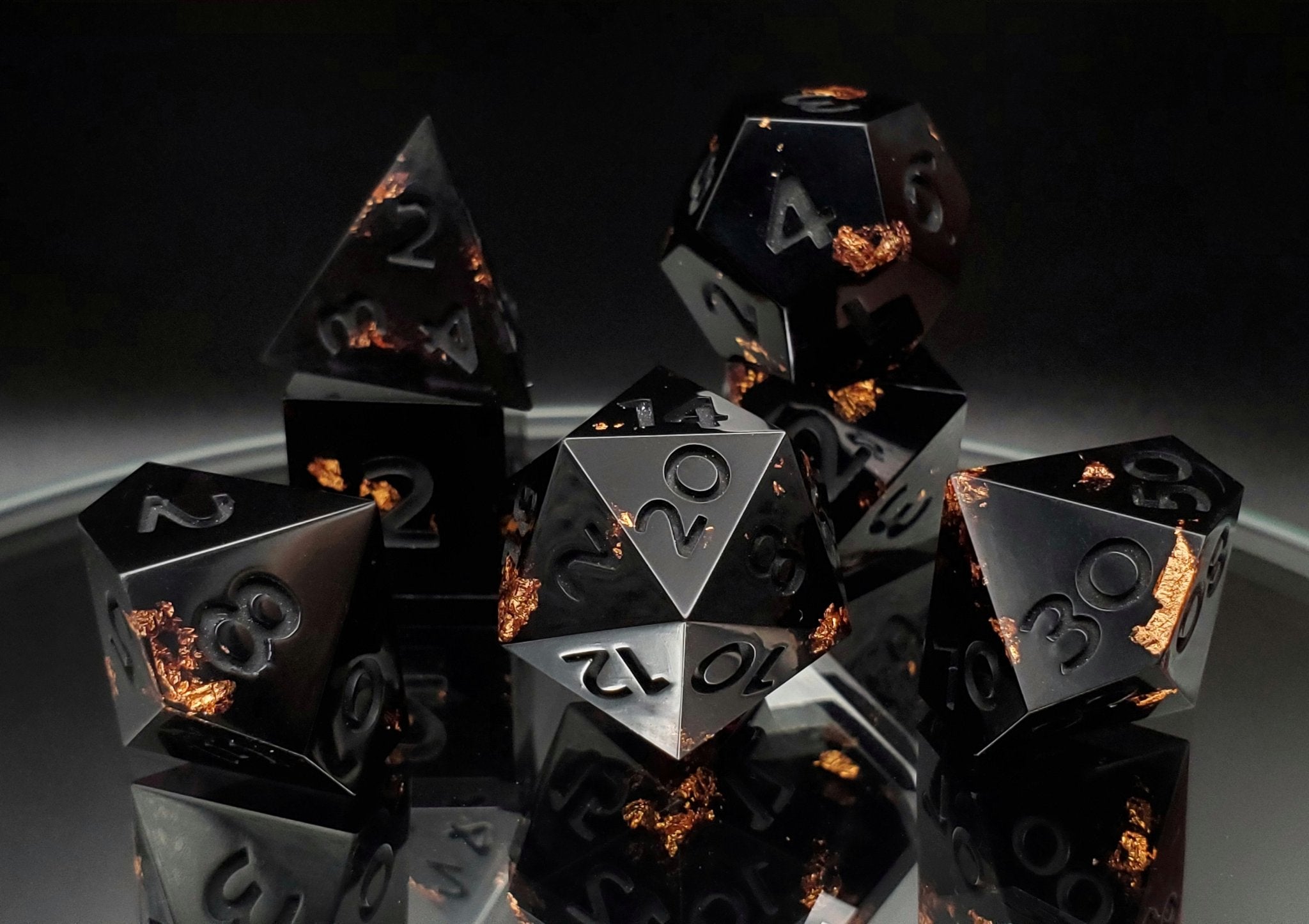 The Void, black dice with copper foil and black numbers